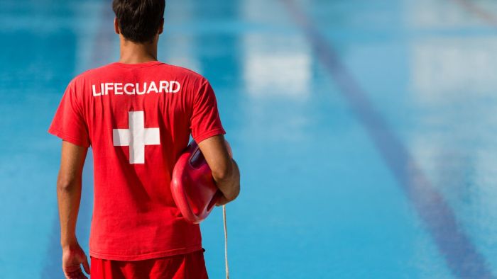 You and another lifeguard find an unresponsive