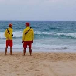 You and another lifeguard find an unresponsive