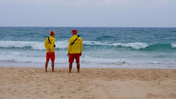 You and another lifeguard find an unresponsive